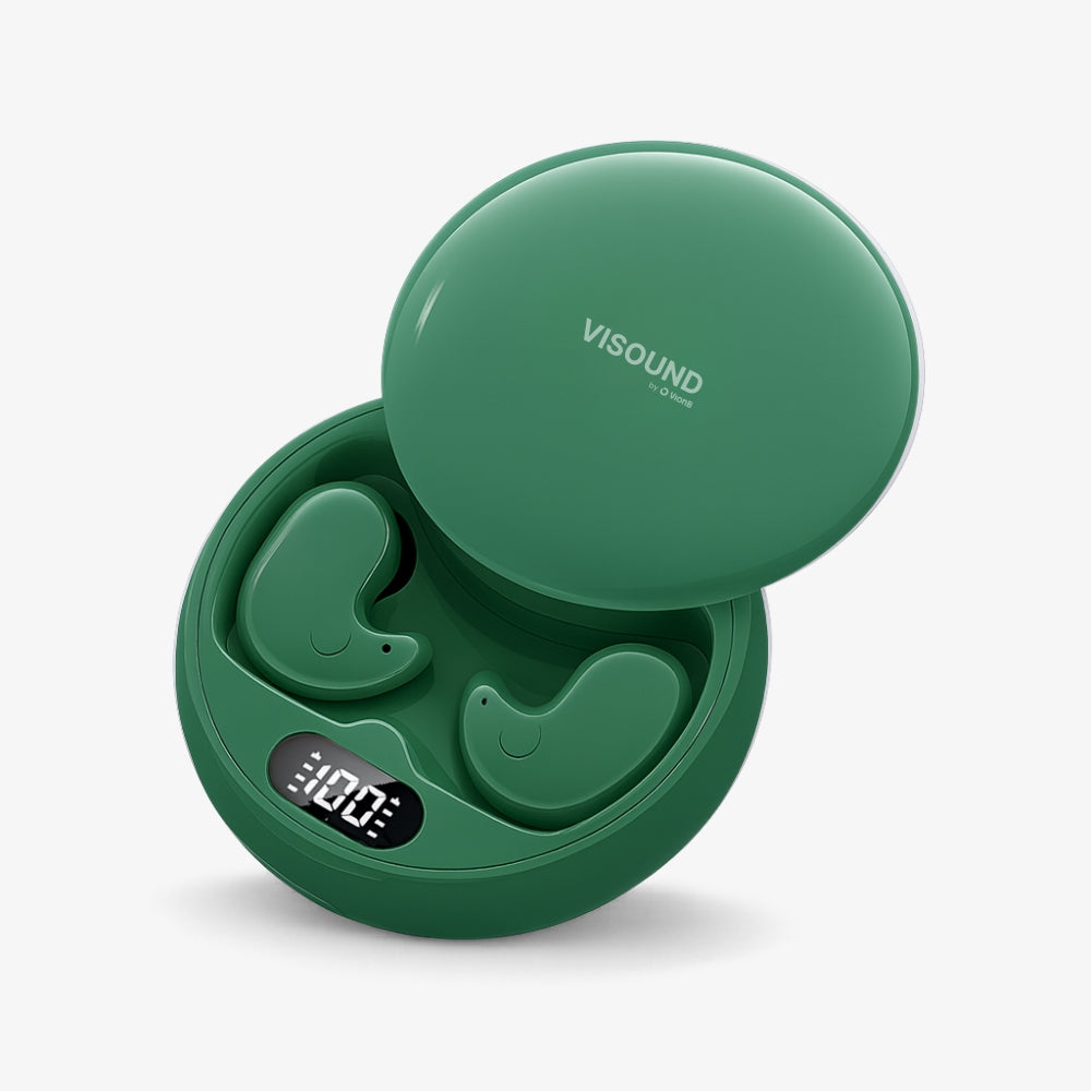 Product Photography by VISOUND by O Vions of deep green wireless earbuds in an open rounded charging case featuring a digital battery display showing 100 and a unique subtle smile design