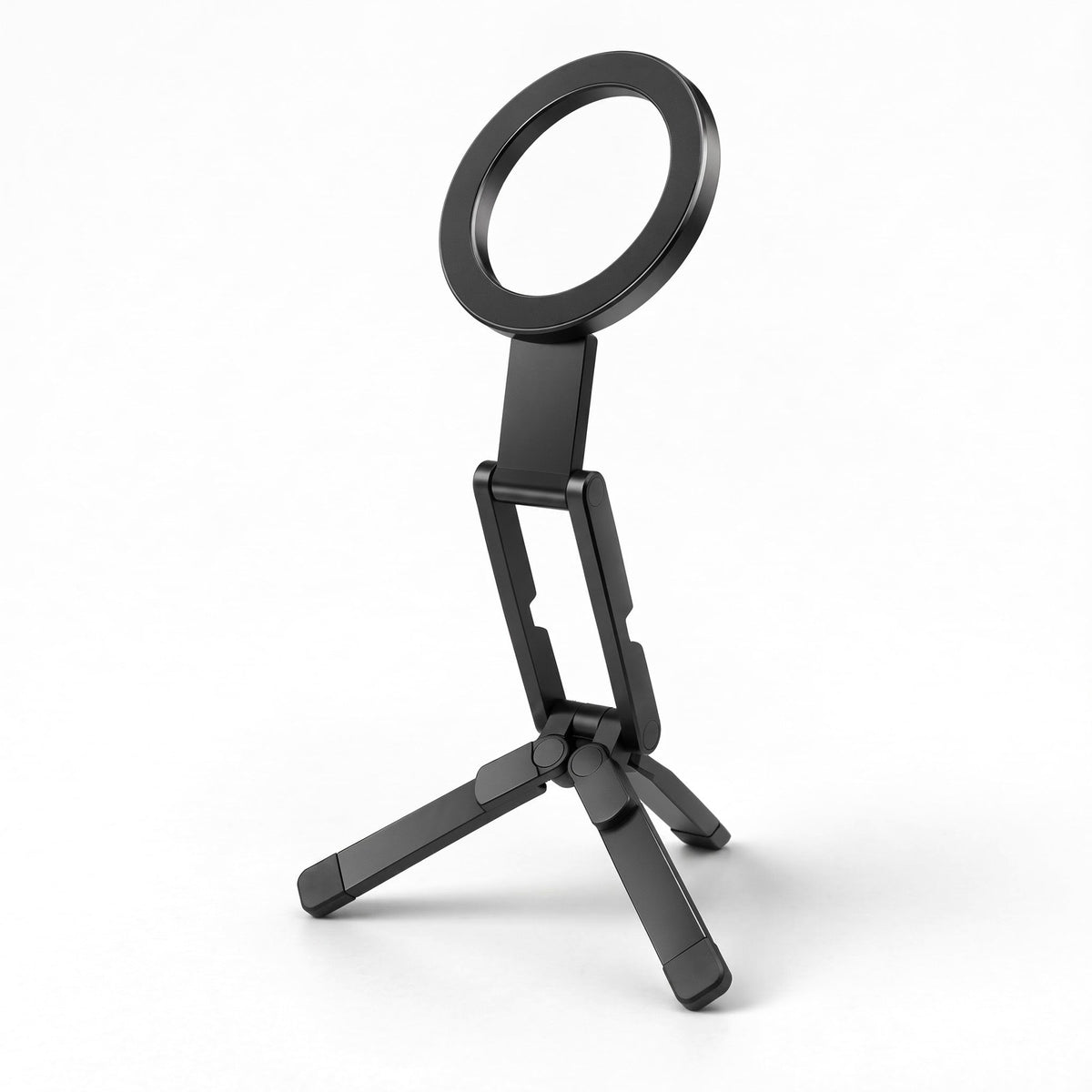 Pose magnetic pocket tripod in Black, open on its three legs with the ring tilted