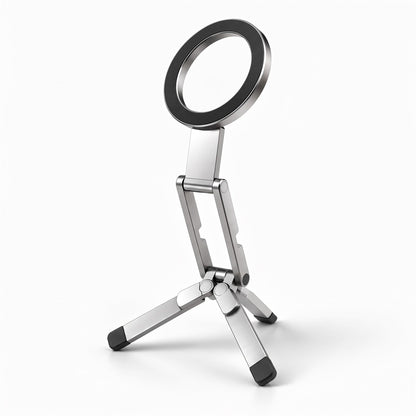 Pose magnetic pocket tripod in Silver, open on its three legs with the ring tilted