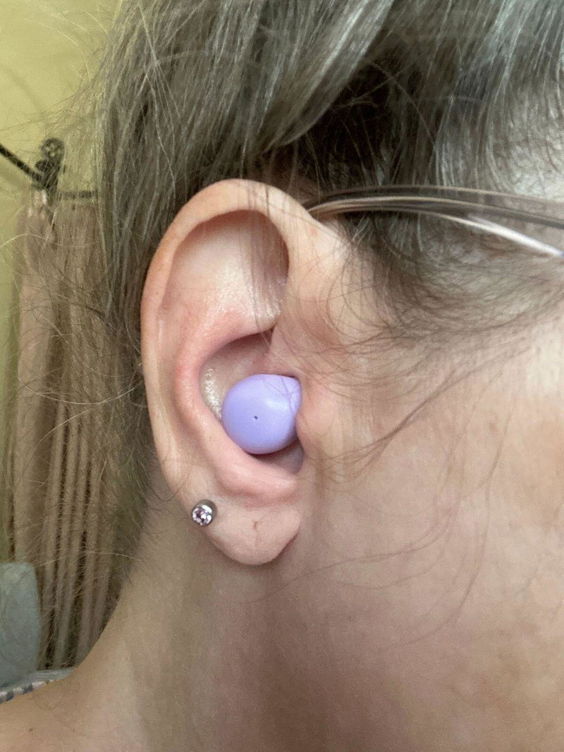 Lavender ViSound Air earbud worn in the ear